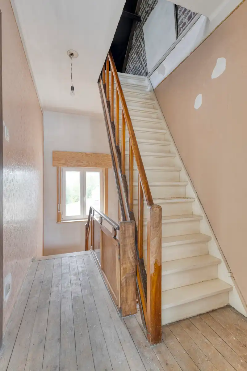 Deels te renoveren lichtrijke driegevelwoning  foto 13