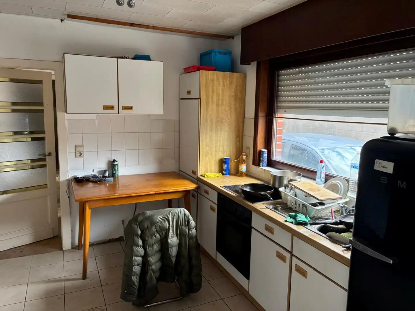 Te renoveren woning met magazijn en inrijpoort foto 8