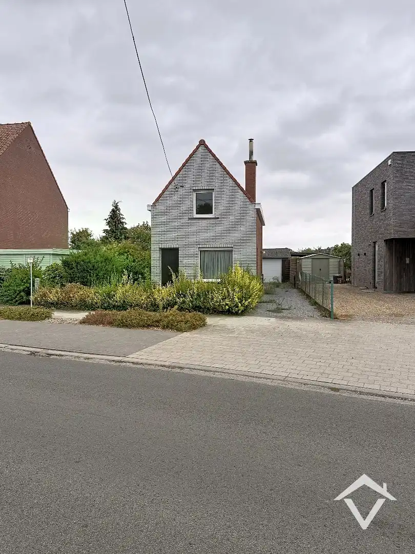 Alleenstaande woning met twee slaapkamers, tuin en garage te Roeselare foto 28