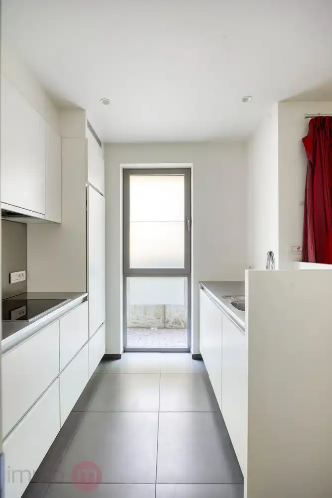 Recent gelijkvloers app. met 2 slaapkamers, tuin en 2 autostaanplaatsen. foto 12