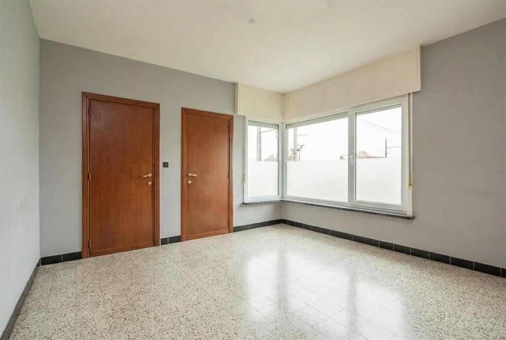 Te renoveren woning met achterliggend weiland foto 8