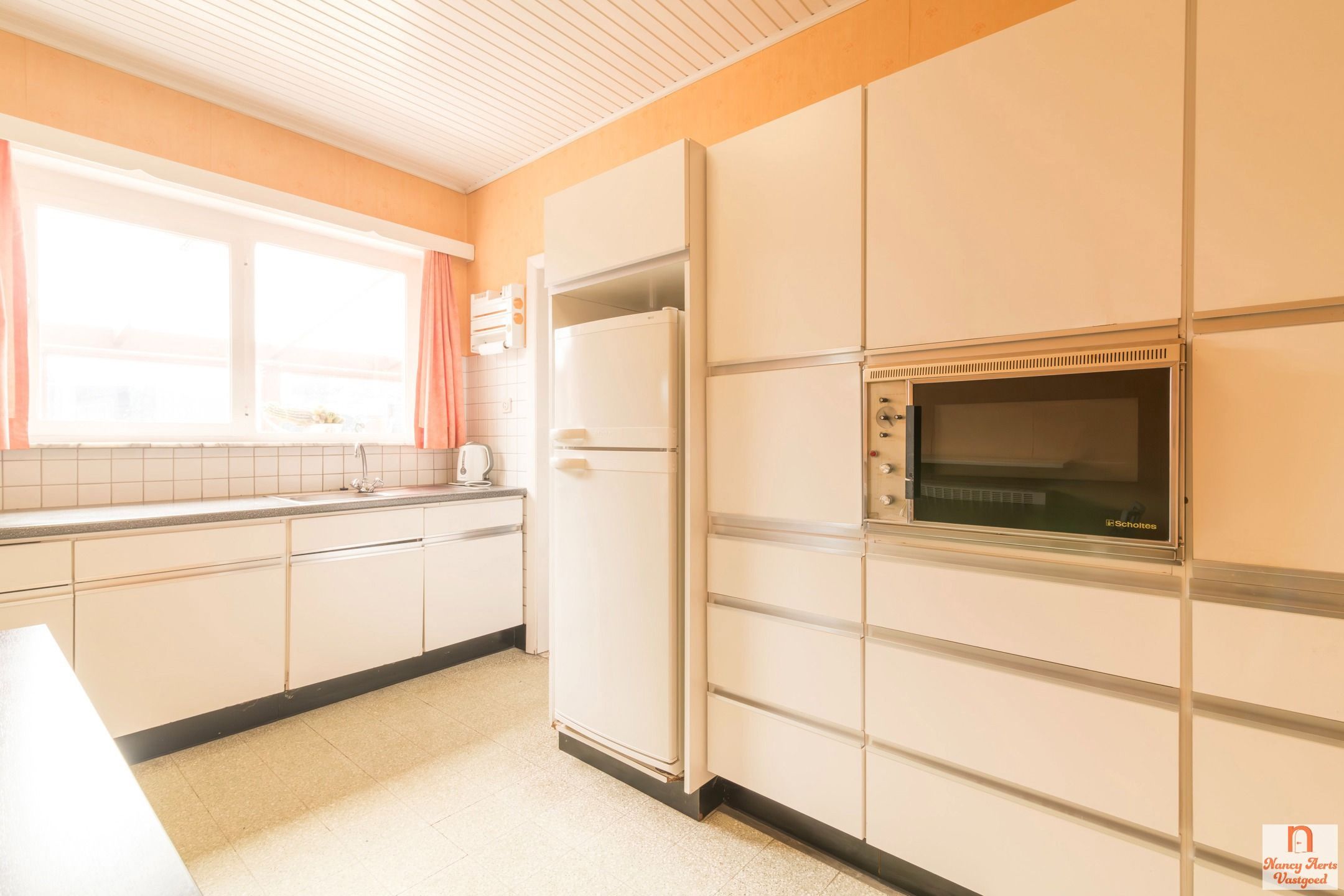 Charmante woning met grote tuin en renovatiemogelijkheden foto 13