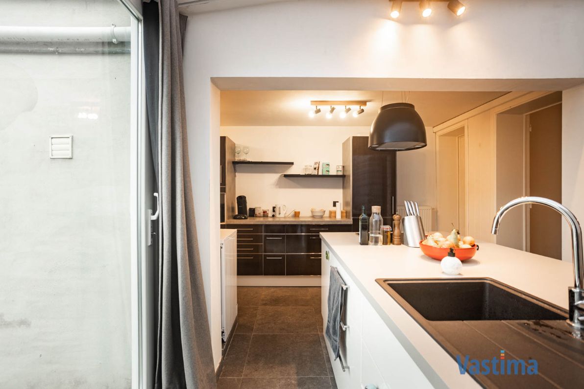 Gerenoveerde gezinswoning met tuin in Erembodegem foto 10