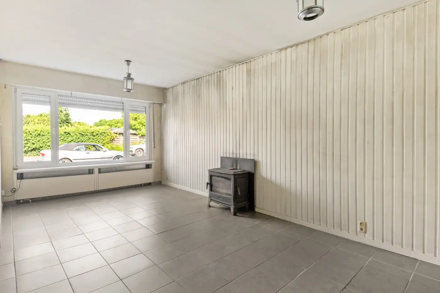 Te renoveren woning met 3 slpk., garage en tuin foto 3