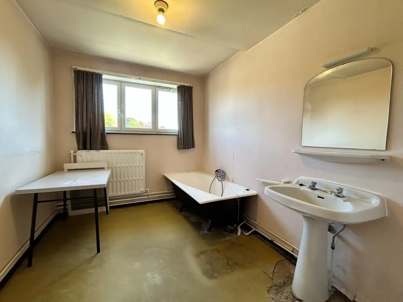 Te renoveren woning op bijna 30 are in Rotselaar foto 15