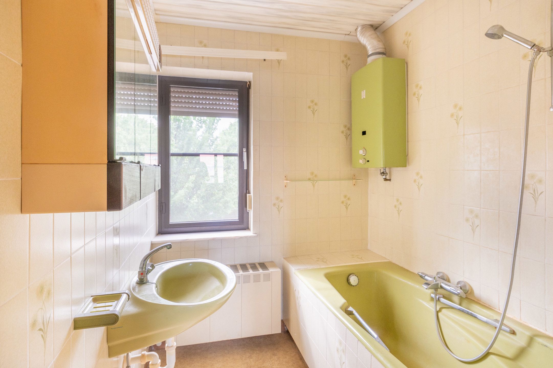Knusse te renoveren woning met leuke tuin foto 30