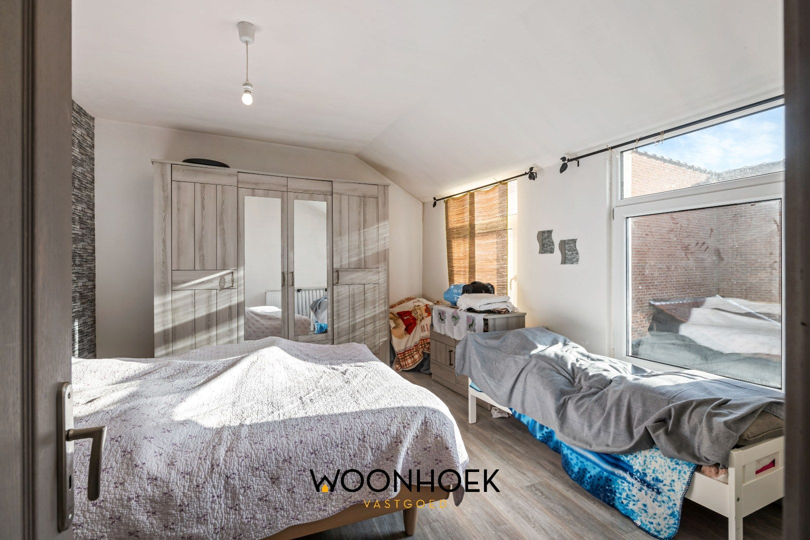 Ruime woning in centrum Waasmunster  foto 12