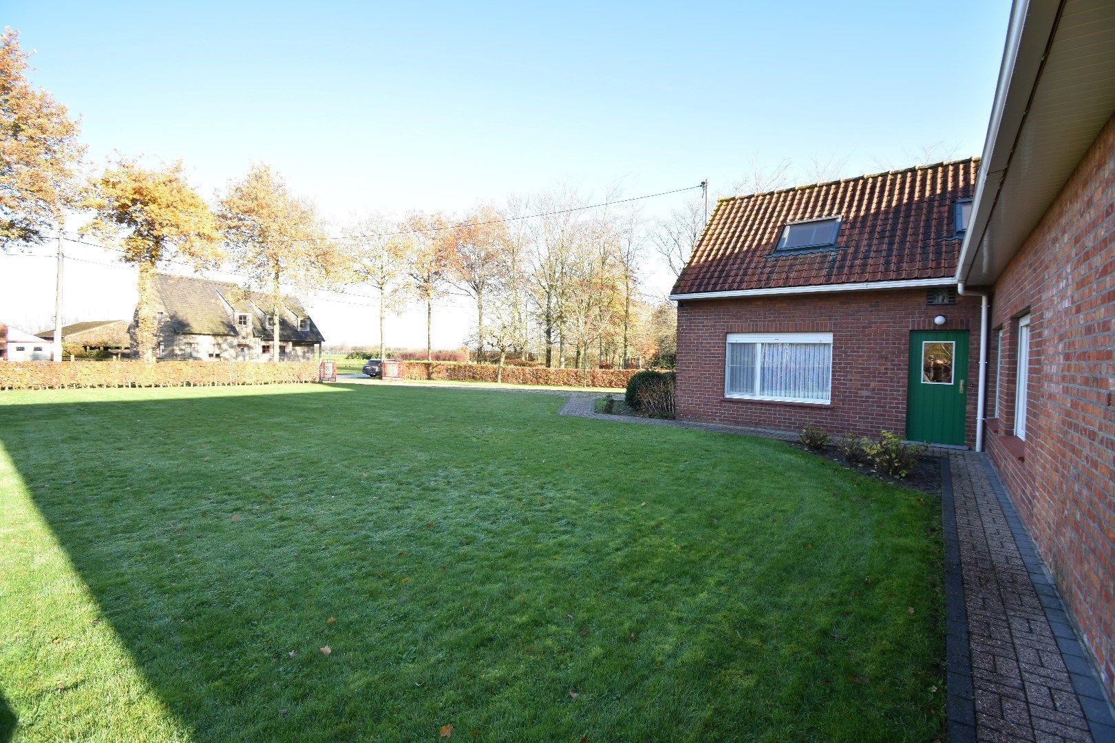 Alleenstaande woning met garage en tuin - vrij uitzicht over de velden foto 26