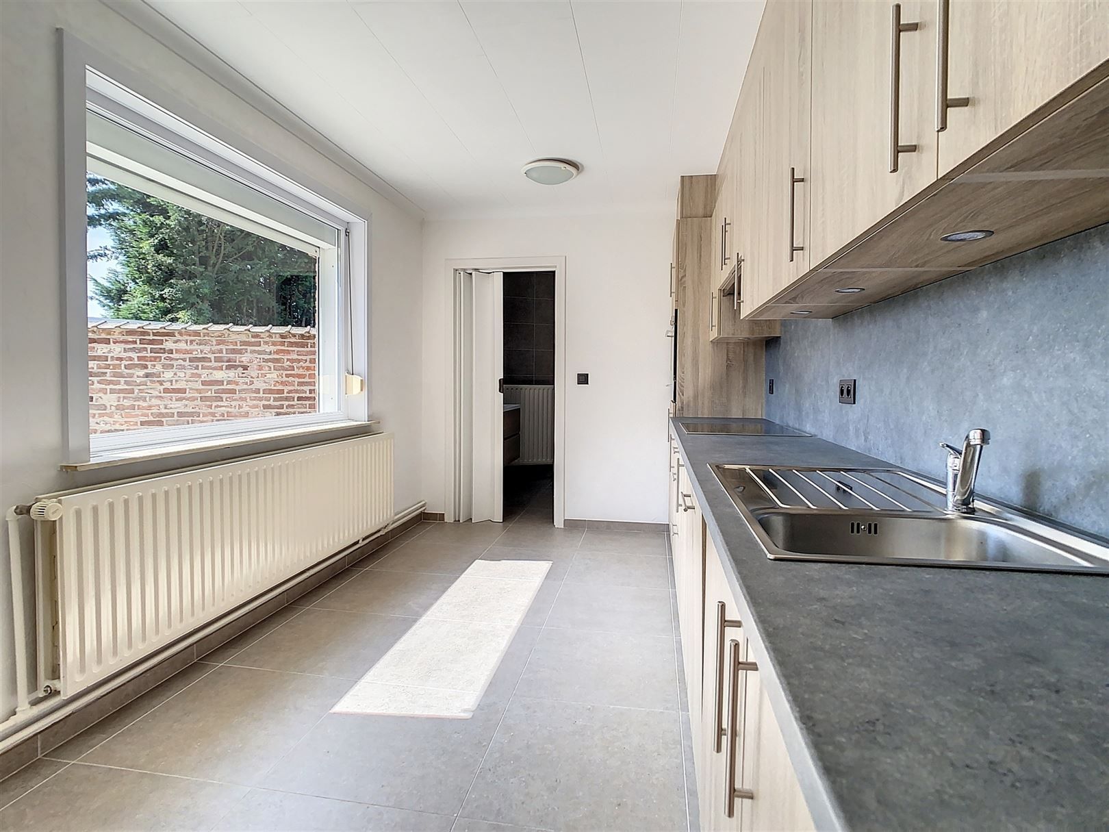 Instapklare woning, 2 slpks, tuin en garage foto 36
