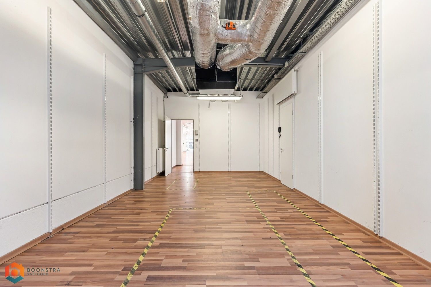 Ruim handelsgelijkvloers op een uitstekende locatie te Heist-op-den-Berg foto 19