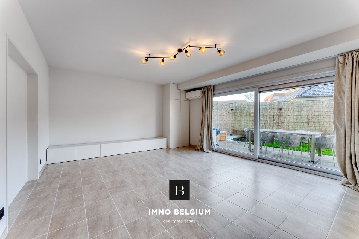 Mooi gerenoveerd appartement met tuintje nabij het centrum foto 3