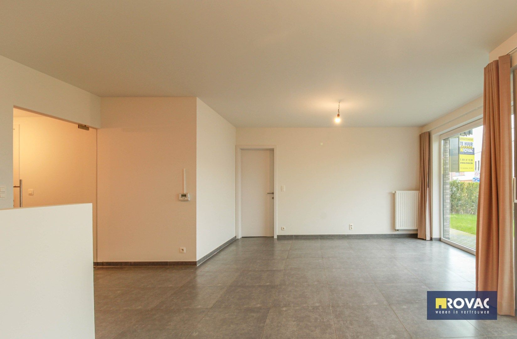 Gelijkvloers appartement met tuin en garage! foto 12