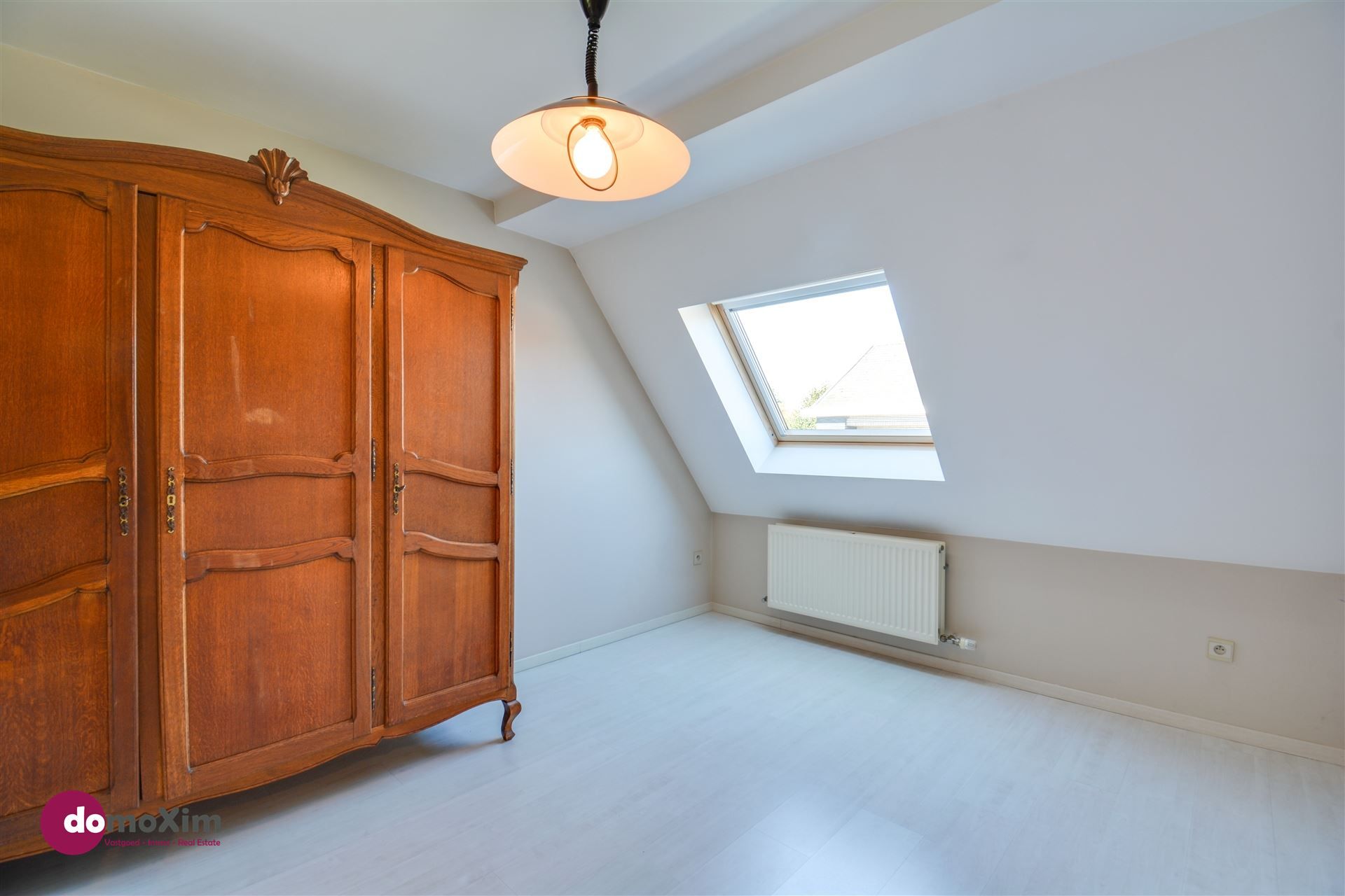 Gezellige rijwoning met 2 slaapkamers en garage in centrum Rijmenam foto 13