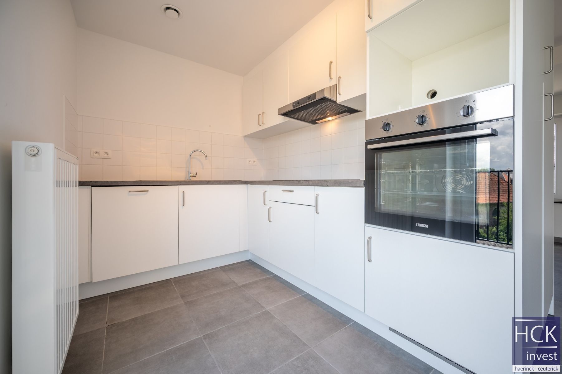 KRUISHOUTEM - Nieuwbouwappartement met 1 SLPK, pal in centrum! foto 6