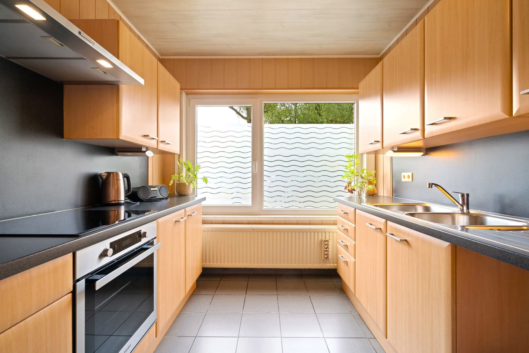 Ruim gelijkvloers appartement met tuin en garage foto 10