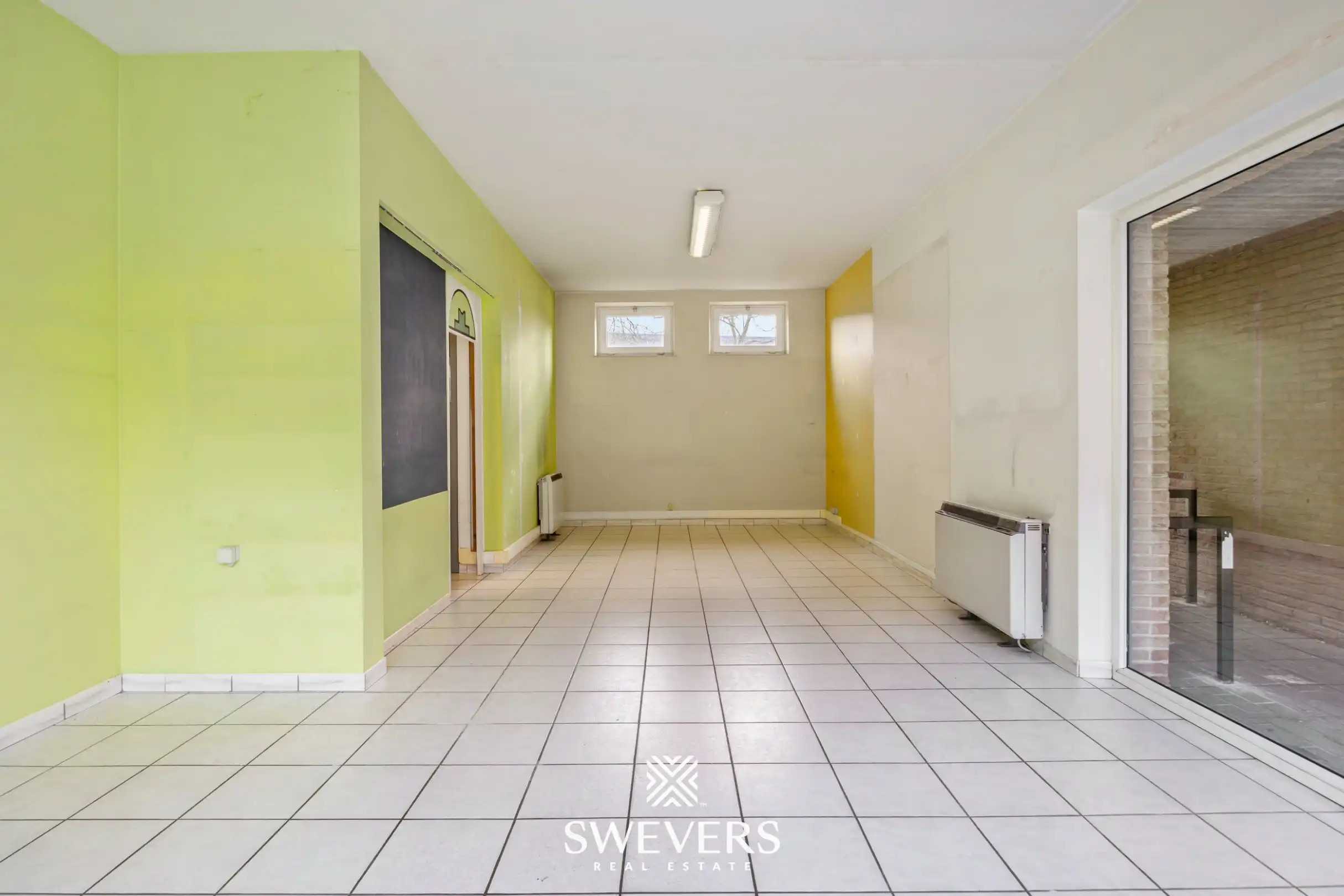 Commercieel pand met garage in centrum Beringen foto 4