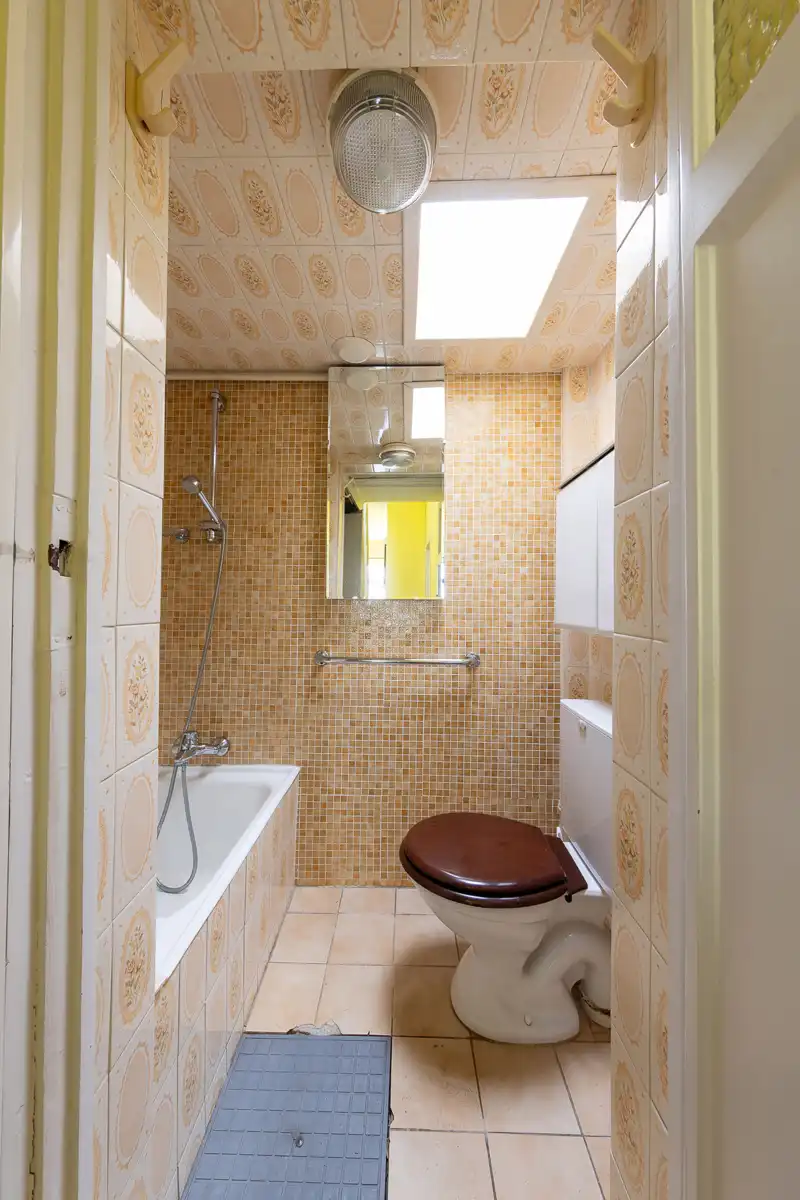 Te renoveren woning met potentieel in Drogenbos foto 6