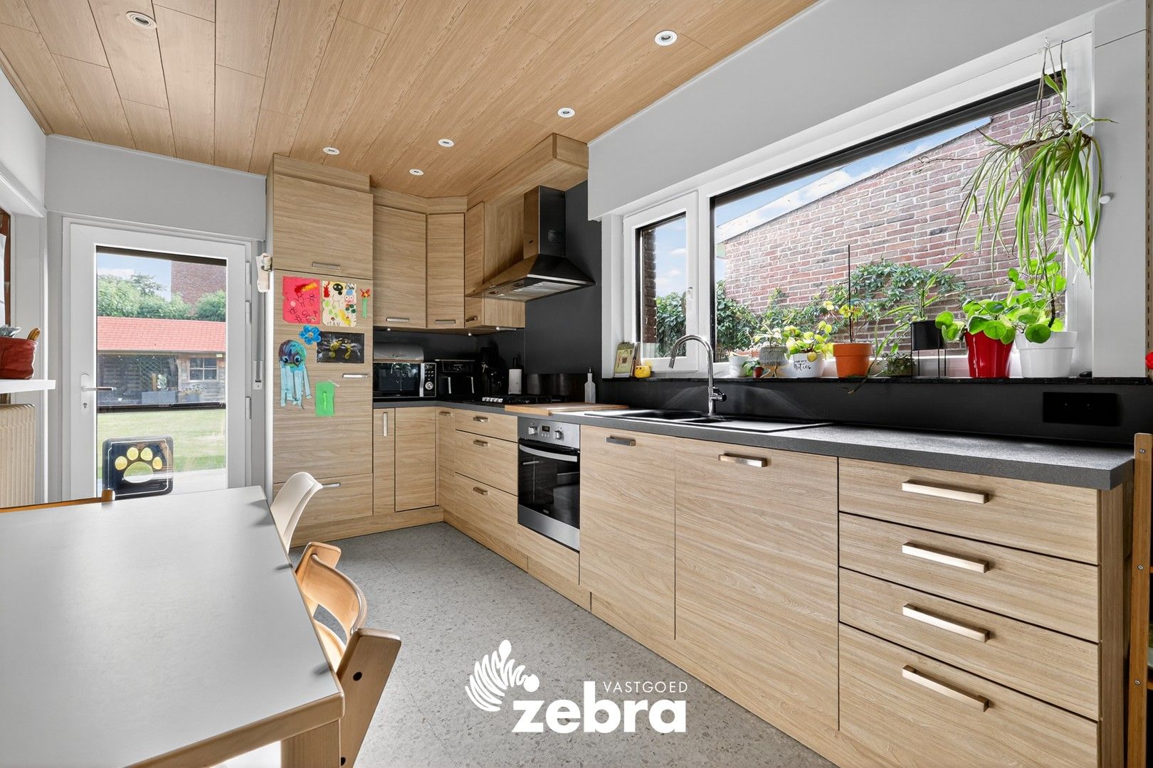 Instapklare ruime HOB met drie slaapkamers en prachtige tuin te Tielt! foto 12