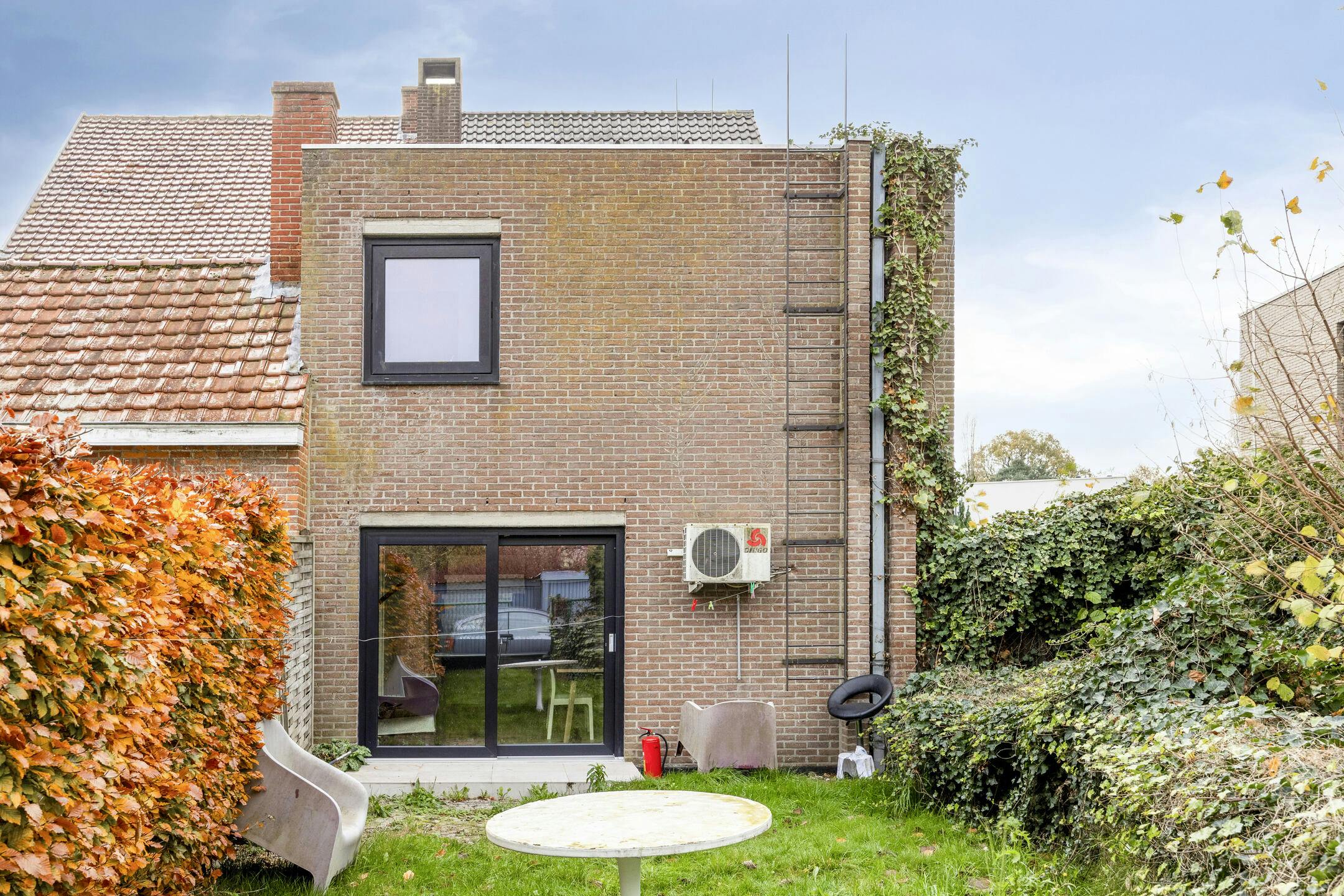 Opbrengsteigendom met 9 studentenkamers en duplex-appartement te Hasselt foto 19