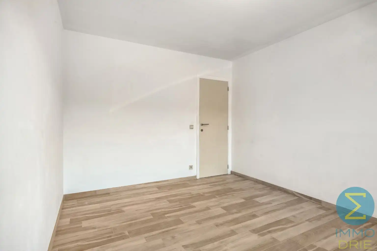 Opbrengsteigendom met 3 verhuurde appartementen en garages foto 11