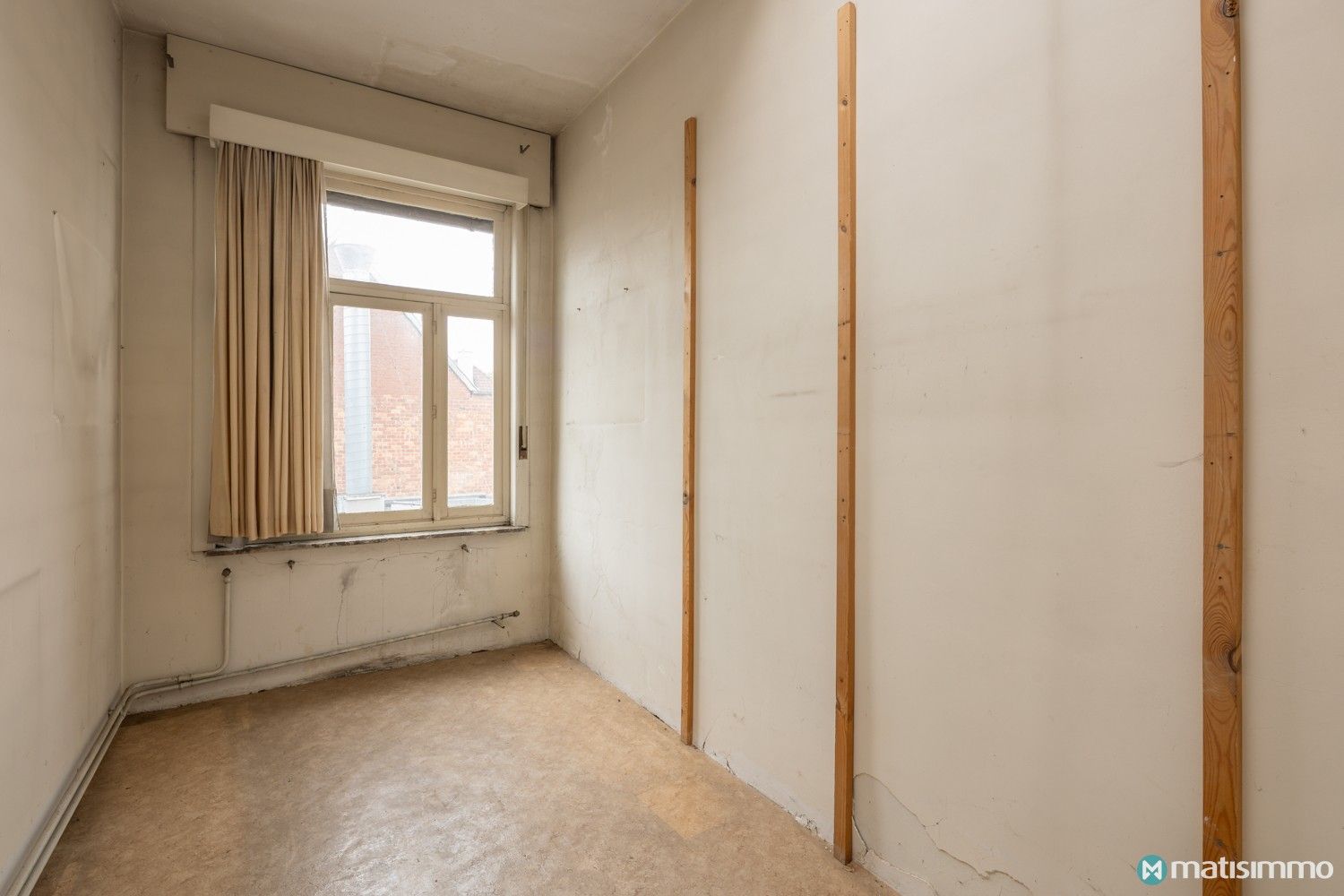 GOED GELEGEN PROJECT VOOR 3 APPARTEMENTEN + 6 AUTOSTAANPLAATSEN IN CENTRUM BILZEN foto 31