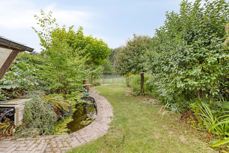 Halfopenbebouwing met drie slaapkamers, tuin en garage foto 13