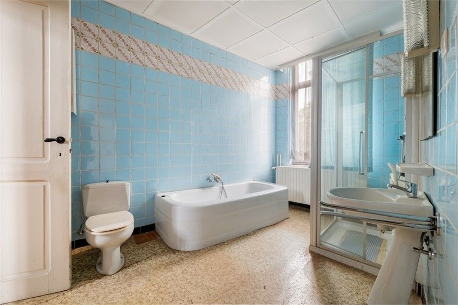 TE RENOVEREN STADSWONING MET VEEL POTENTIEEL IN HET STADSCENTRUM VAN SINT-TRUIDEN foto 24