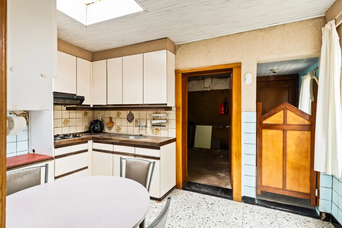 Te renoveren woning met 3 slpk., stadstuin en garage foto 7