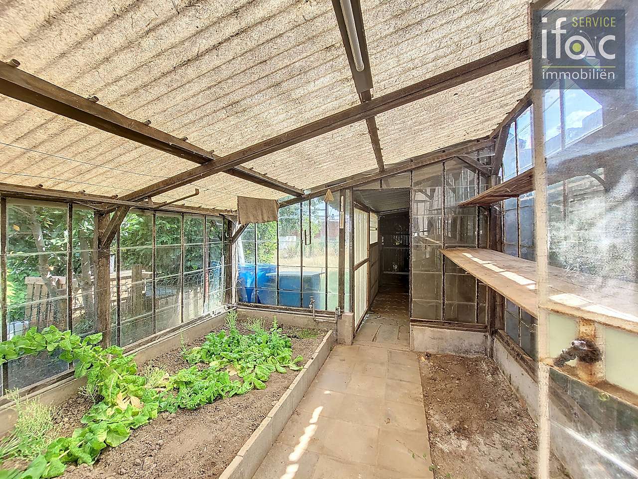 Rijhuis te koop foto 8