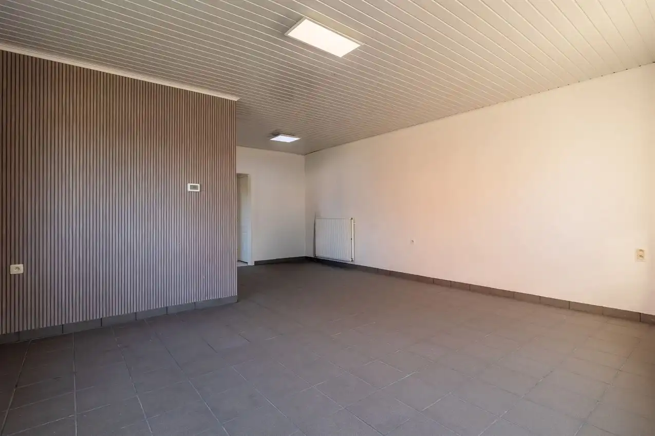 Verzorgde woning met 2 slpk., tuin en garage foto 6