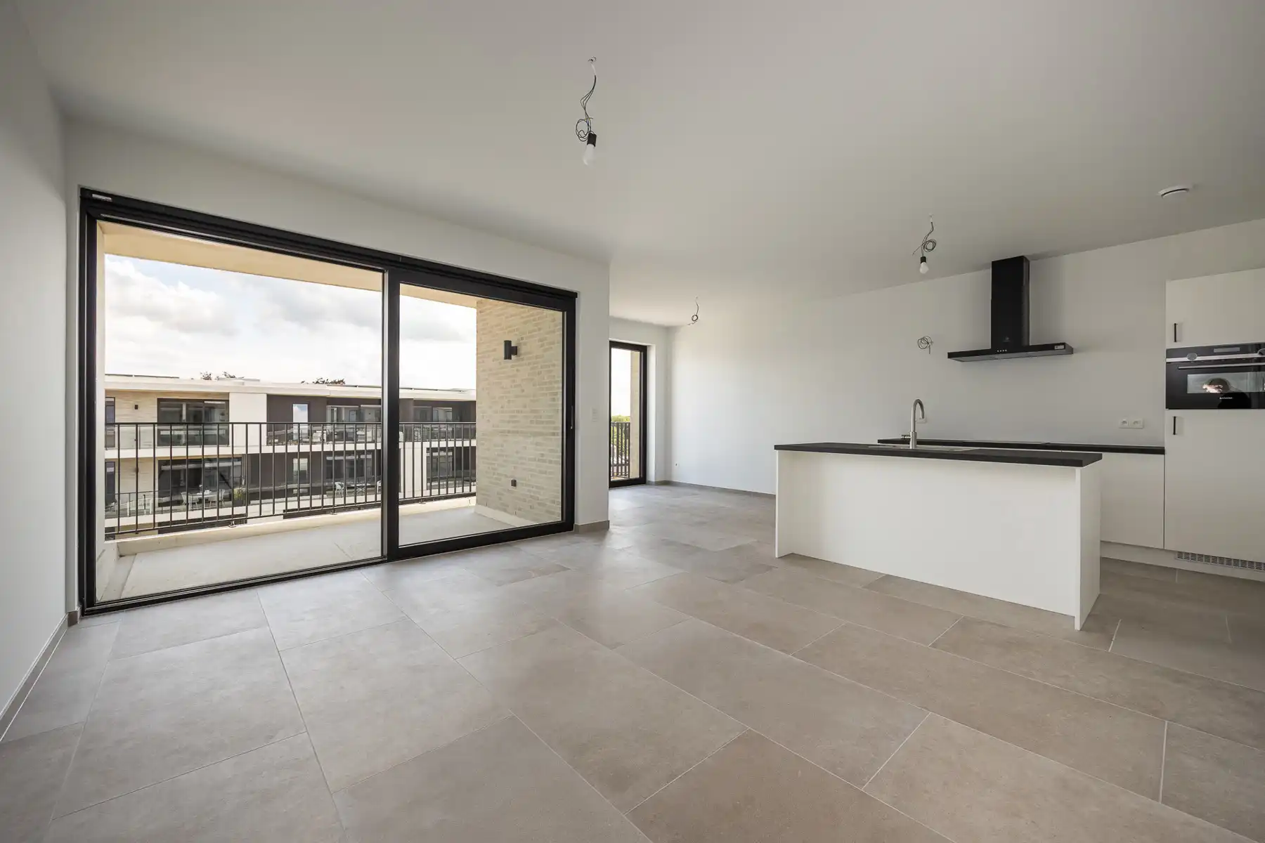 Prachtig nieuwbouwappartement op de 3de verdieping met ondergrondse autostaanplaats en berging. foto 3