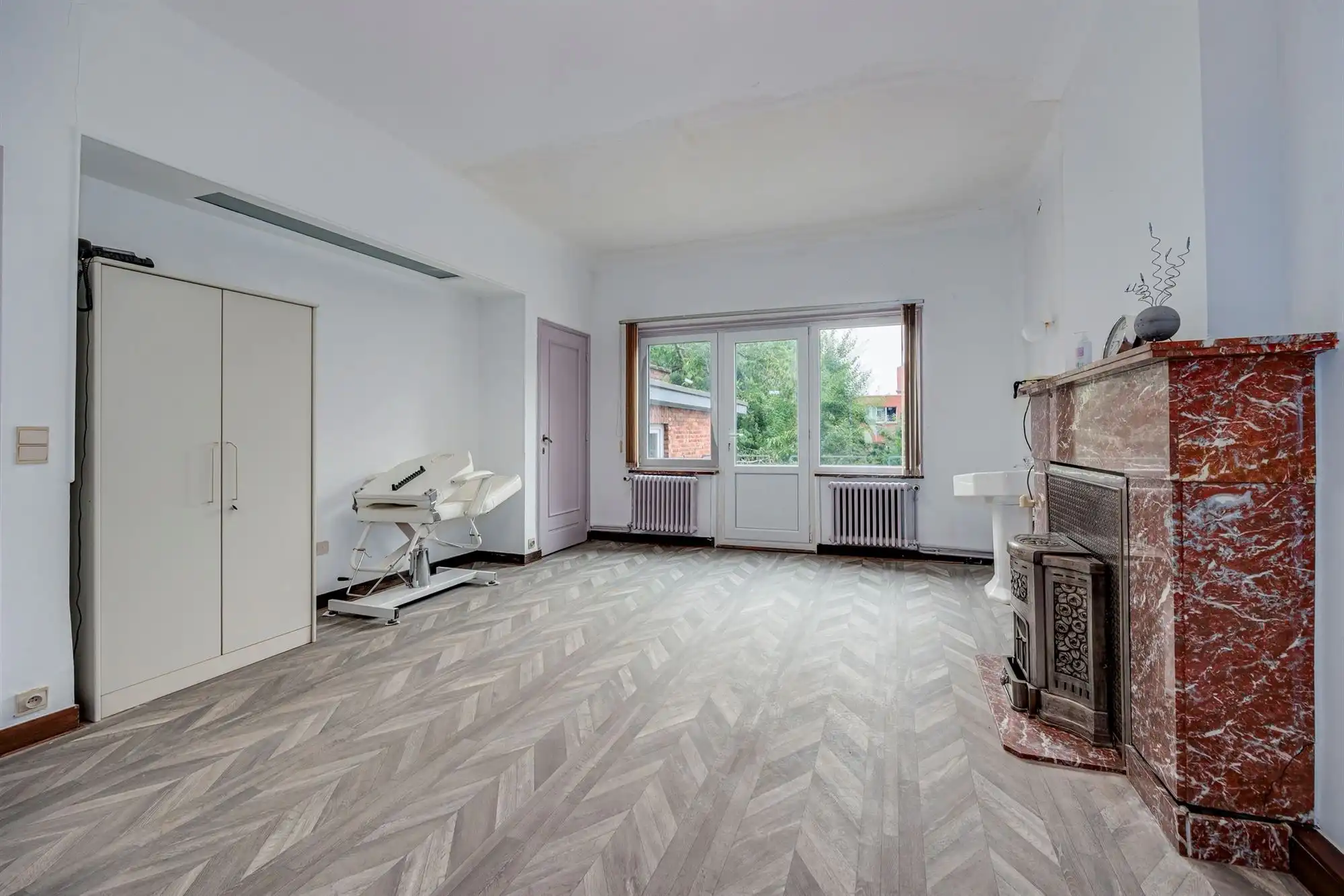 Ruime woning met veelzijdige praktijkruimtes foto 13