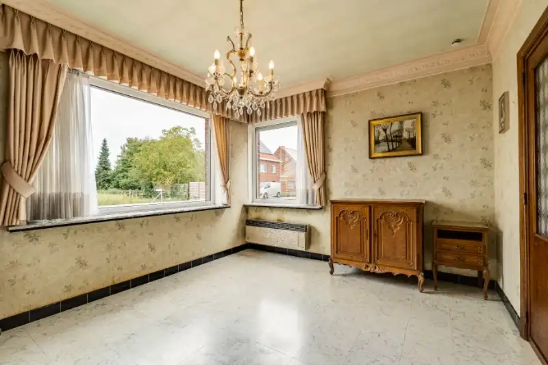 Ruime halfopen woning met potentieel foto 2