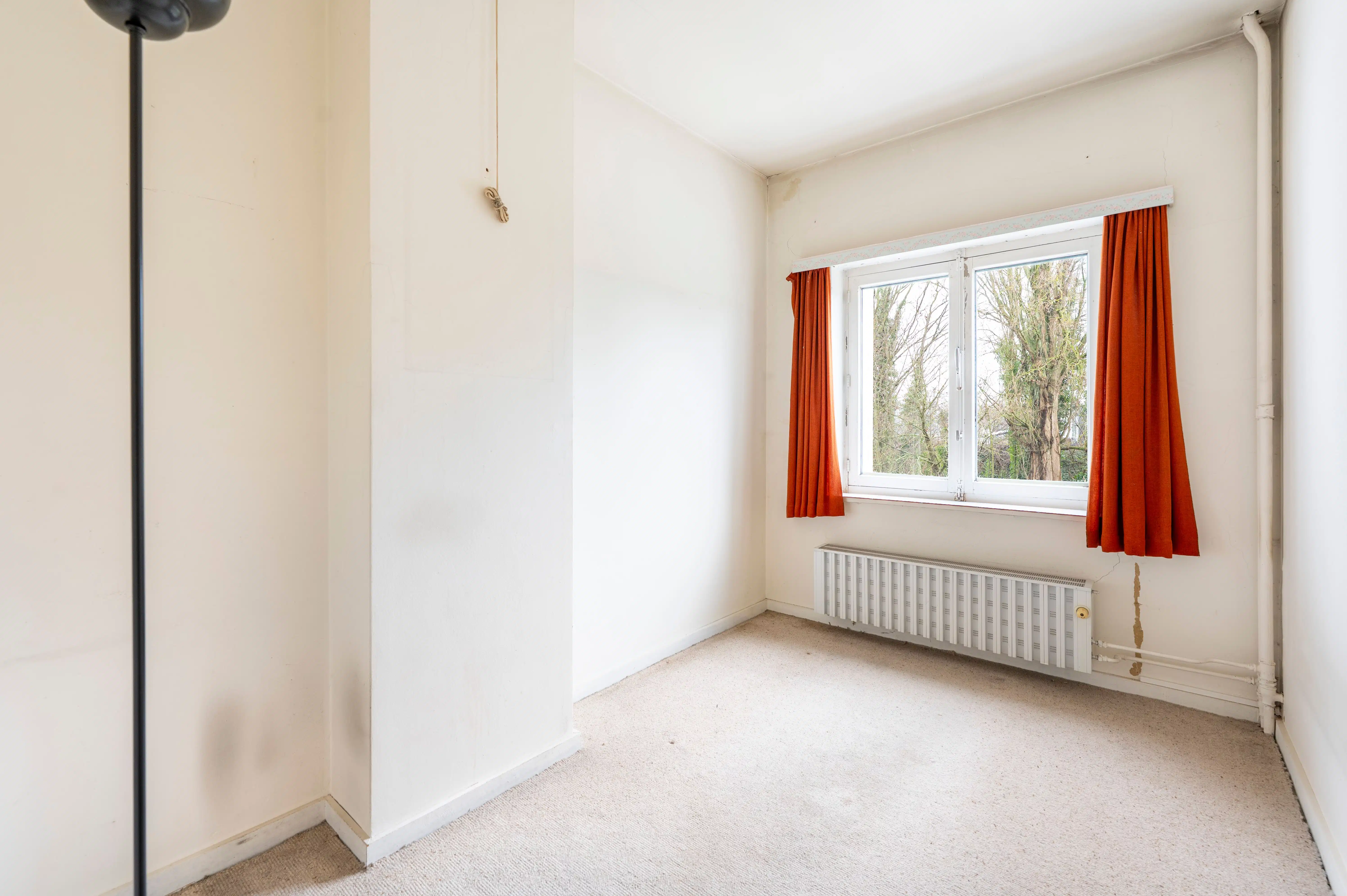 Halfopen bebouwing met veel potentieel, zonnige tuin en garage in Kapellen! foto 17