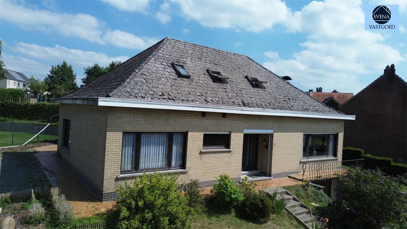 Woning met 4 slaapkamers en garage in rustige omgeving foto 2