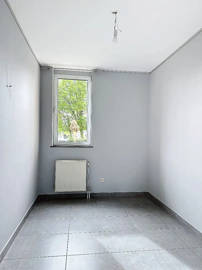 Instapklaar appartement met terras en garagebox! foto 9