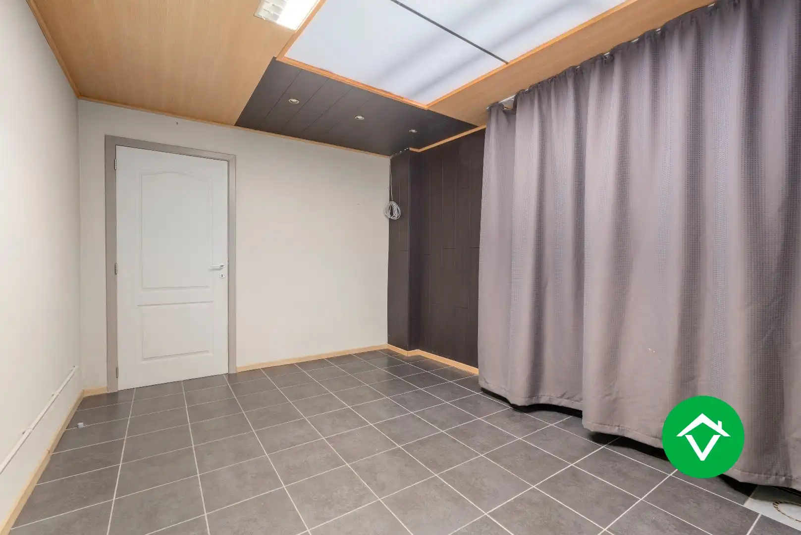 Veelzijdig handelspand met woonst en twee verhuurde appartementen in centrum Aartrijke foto 14