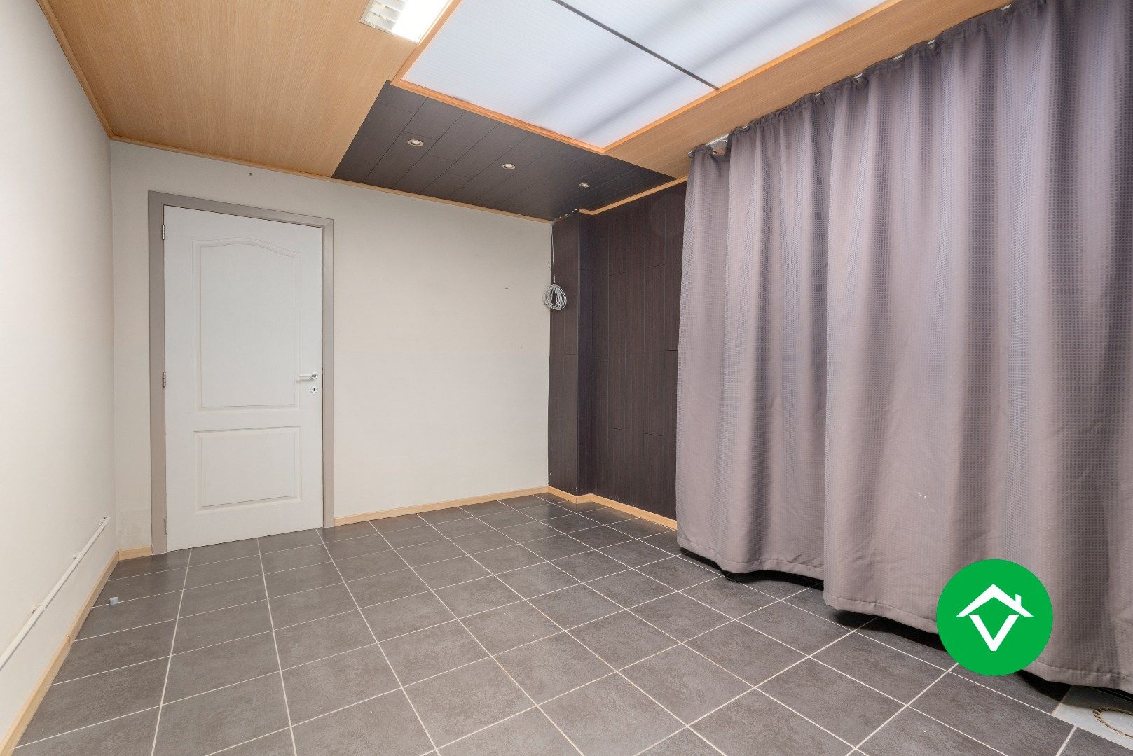 Veelzijdig handelspand met woonst en twee verhuurde appartementen in centrum Aartrijke foto 14