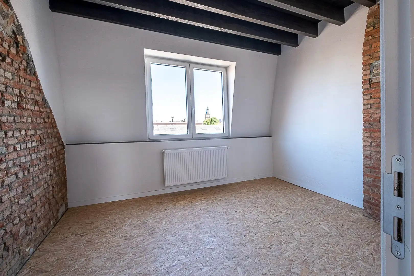 Genieten op hoogte: lichtrijk dakappartement met terras foto 10