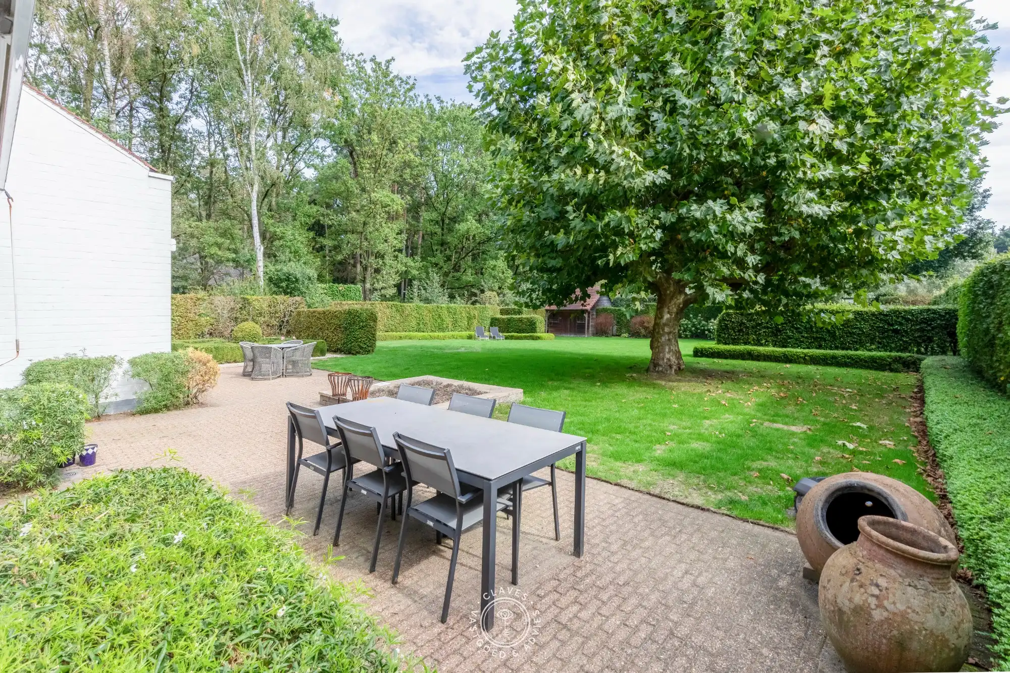 Residentiële villa op een uitzonderlijk groen perceel van meer dan 2.000 m² in de gegeerde Eikenlaan te Belsele foto 23