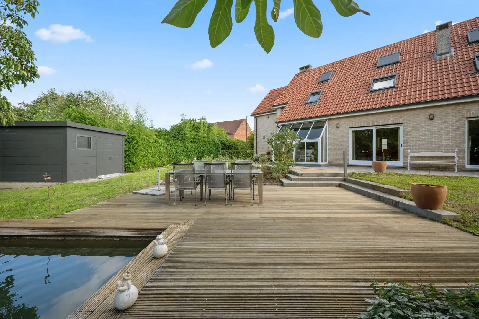 Ruime gezinswoning op een prachtig perceel van ruim 43 are met zwemvijver foto 25