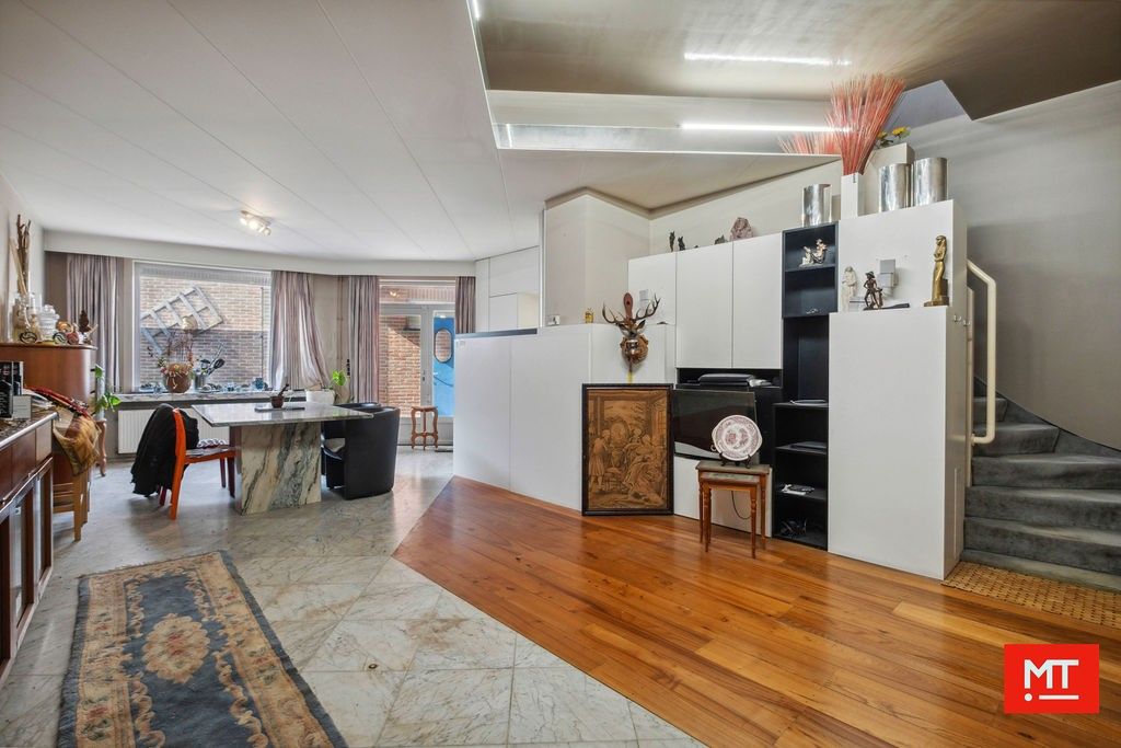 Veelzijdig gebouw bestaande uit handelsruimte, woning en appartement in het centrum van Wervik foto 13