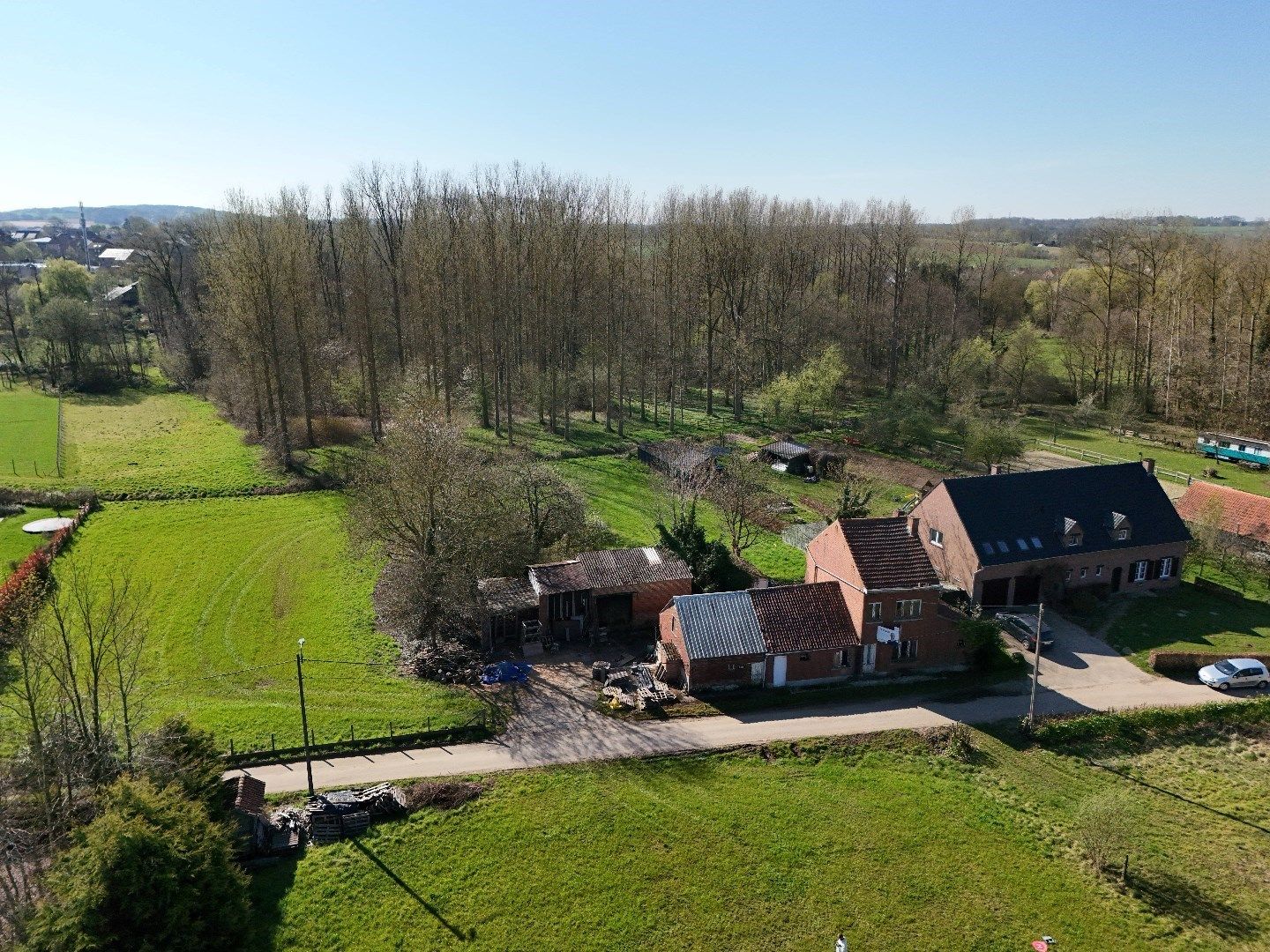 Renovatieproject te koop in Kortrijk-Dutsel (Holsbeek) op een perceel van bijna 14 are foto {{pictureIndex}}