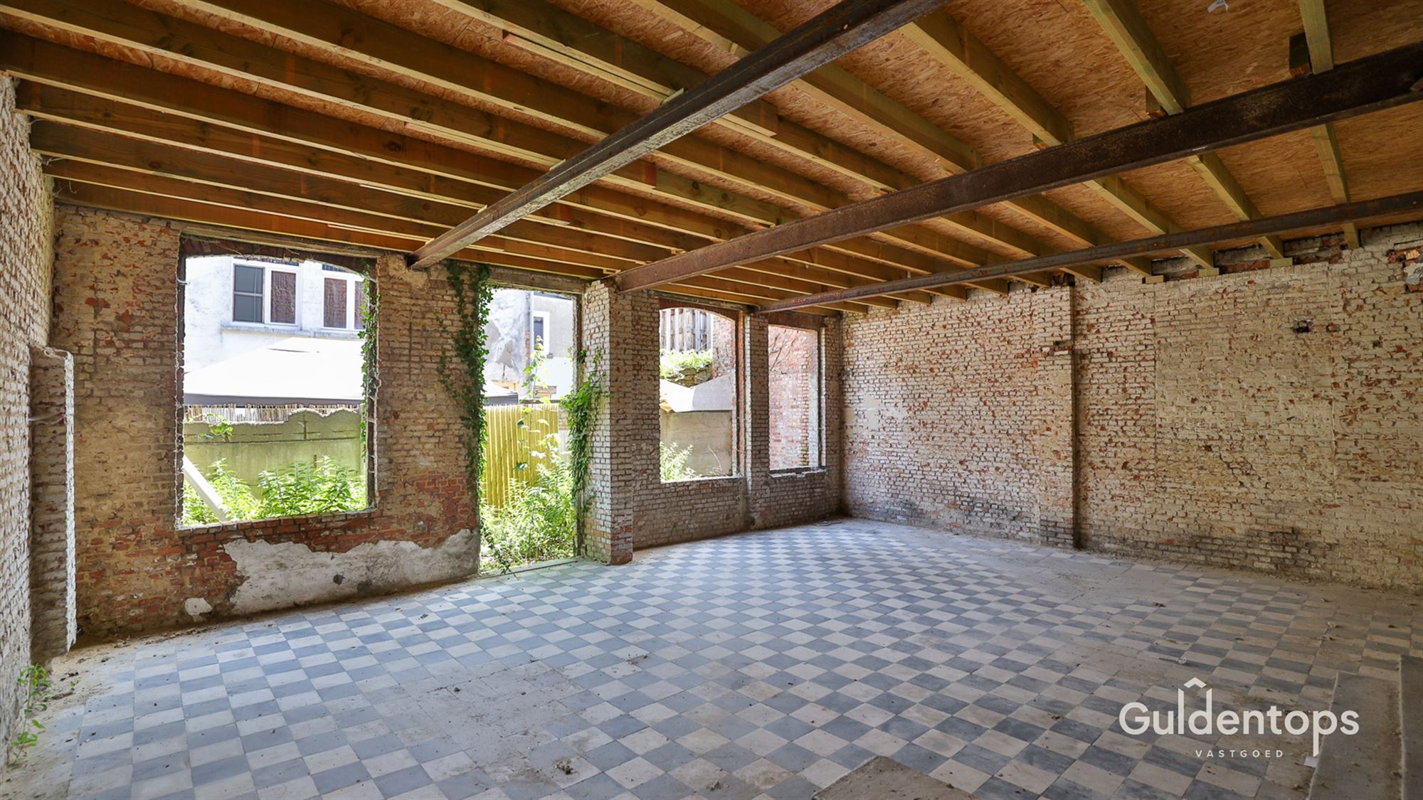 Knap gelijkvloers appartement in hartje Lier met grote tuin foto 24