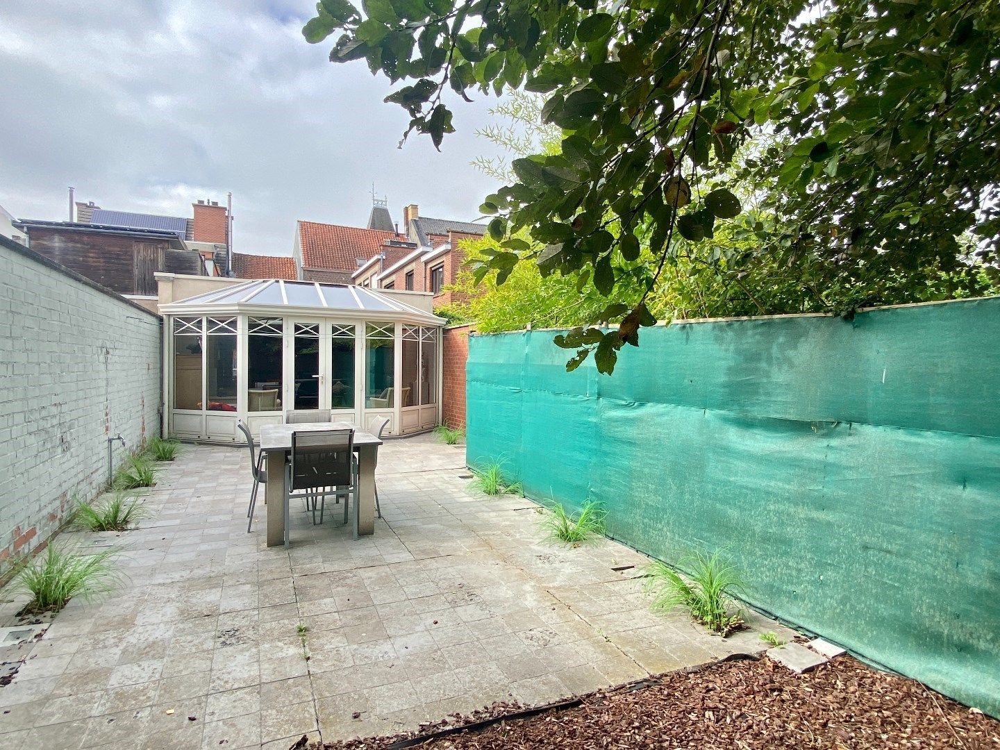 Centraal gelegen woonst met handelsruimte en tuin in het centrum van Kuurne. foto 8