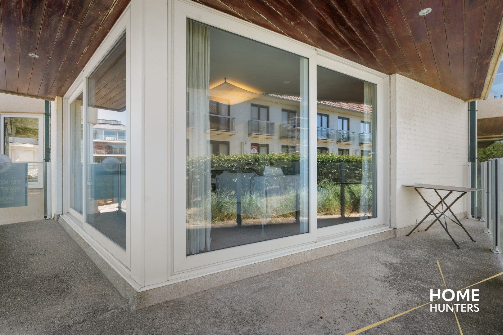 Uniek 2 slaapkamer appartement met zicht op zee en duinen foto 6