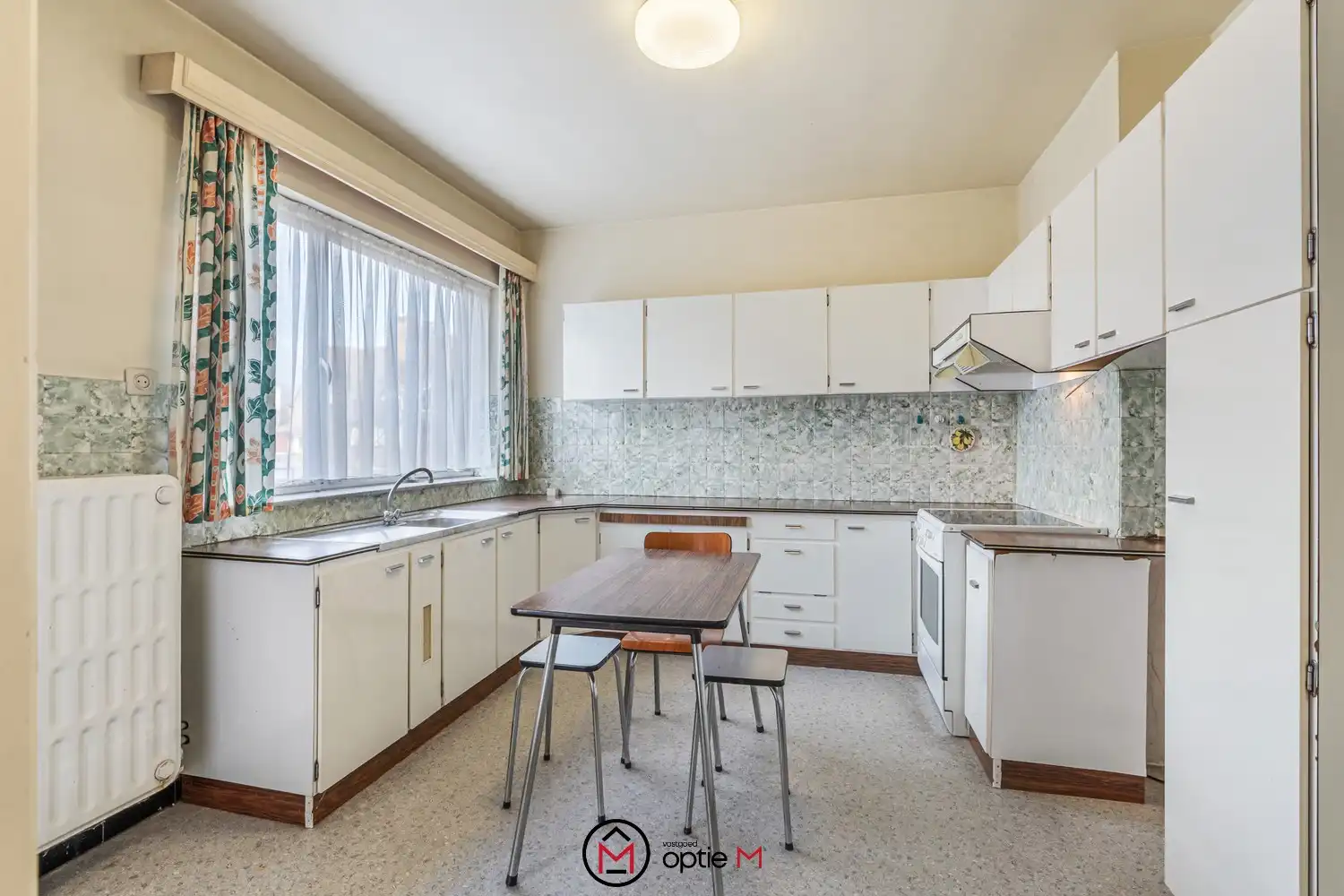 Karaktervolle woning met tuin te koop in centrum Bilzen foto 11