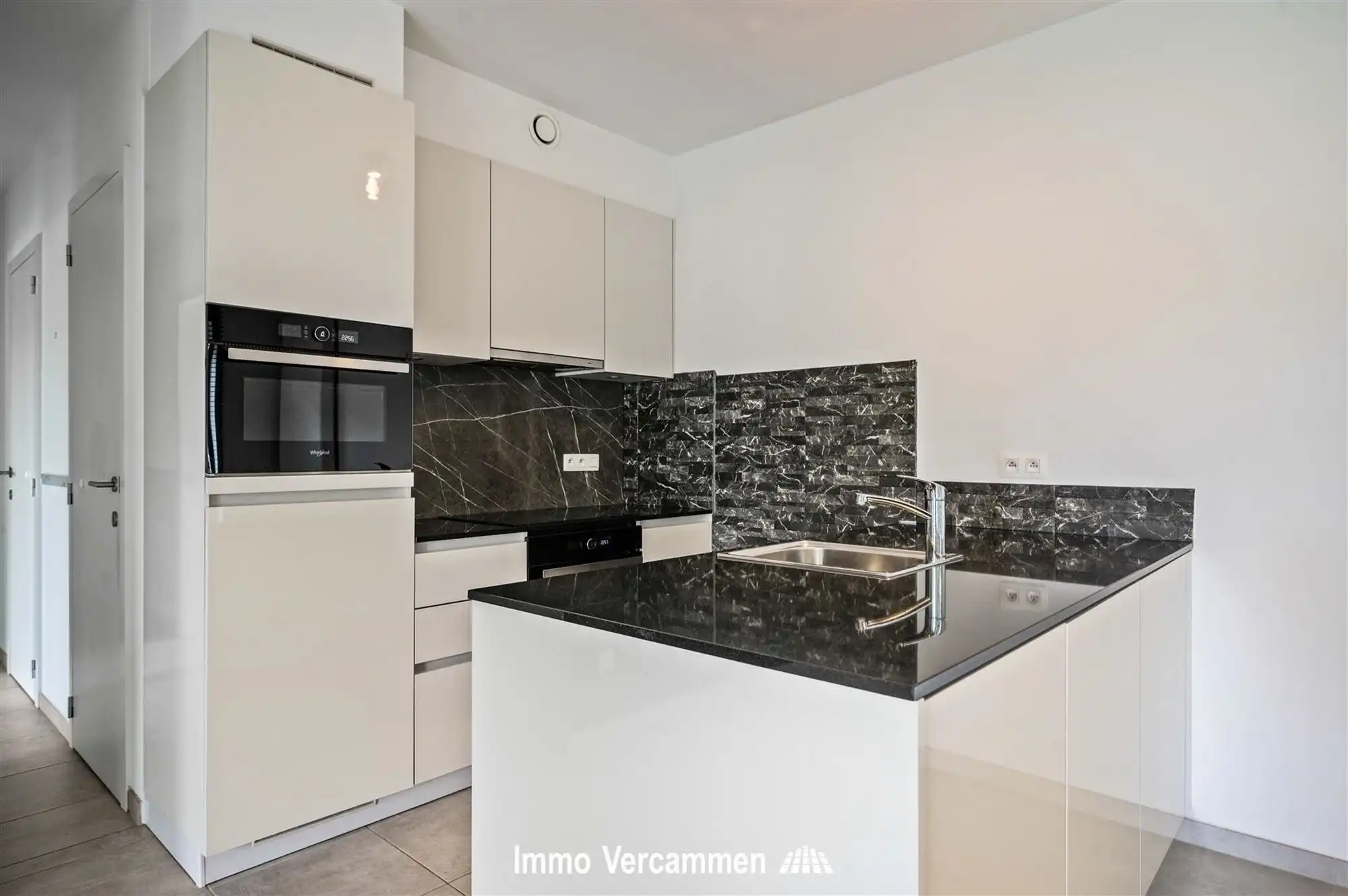 Gelijkvloers appartement met terras en autostaanplaats te Bonheiden foto 4