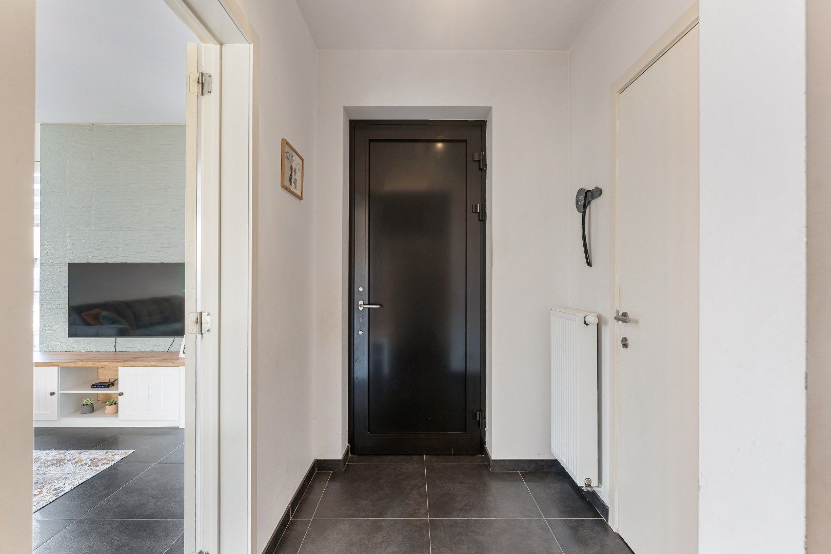 Verzorgde woning met hedendaags energiecomfort, terras, tuin en garage, ideaal voor jong gezin! foto 11