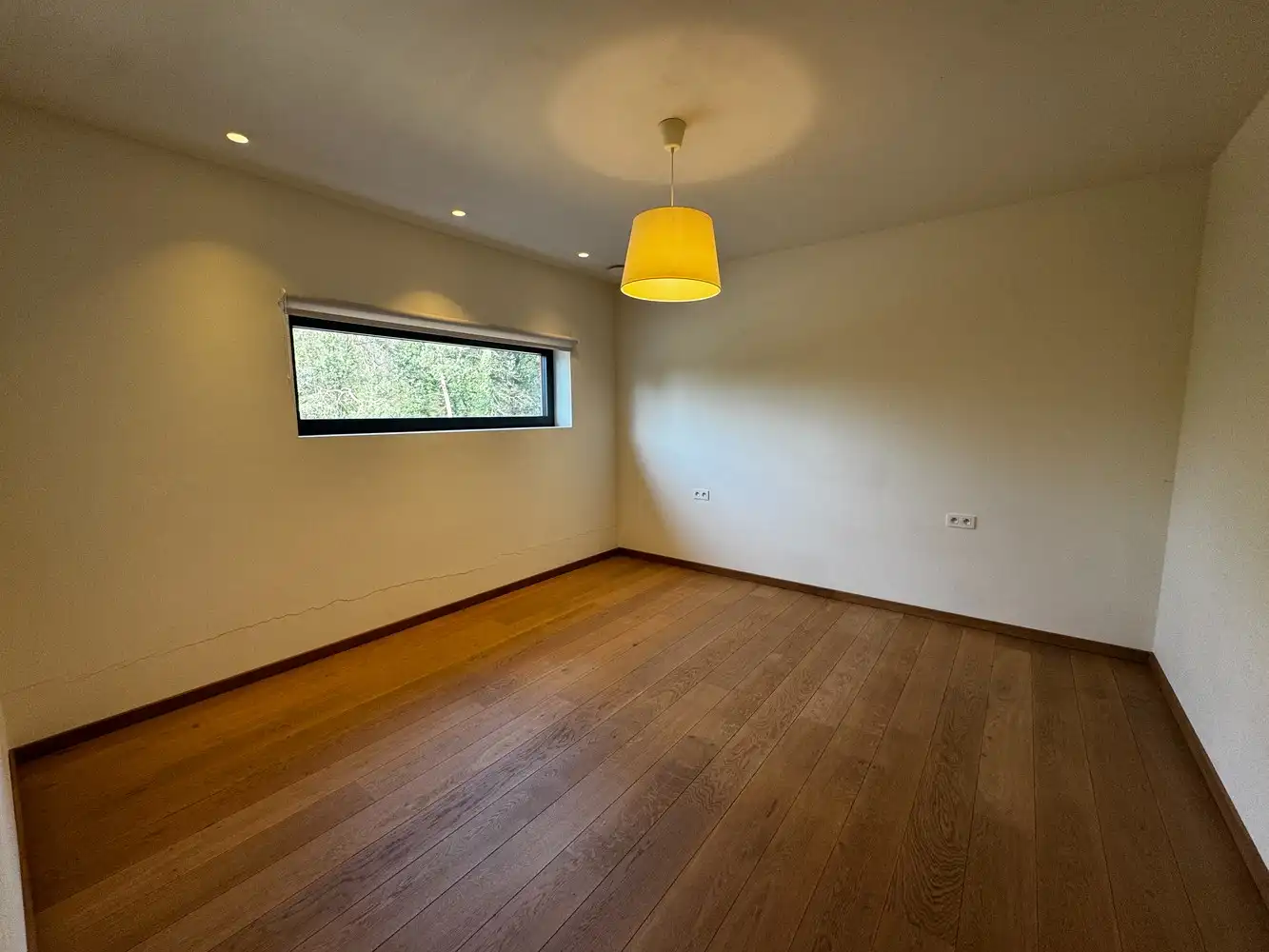 Architecturale woning met unieke split-level leefruimte in het groene Wiemesmeer foto 11